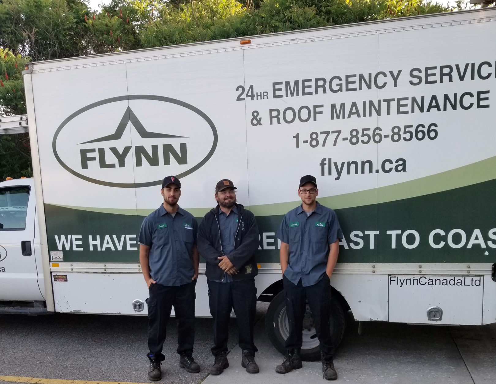 Dubbin Road Flynn crew in front of a Service truck
