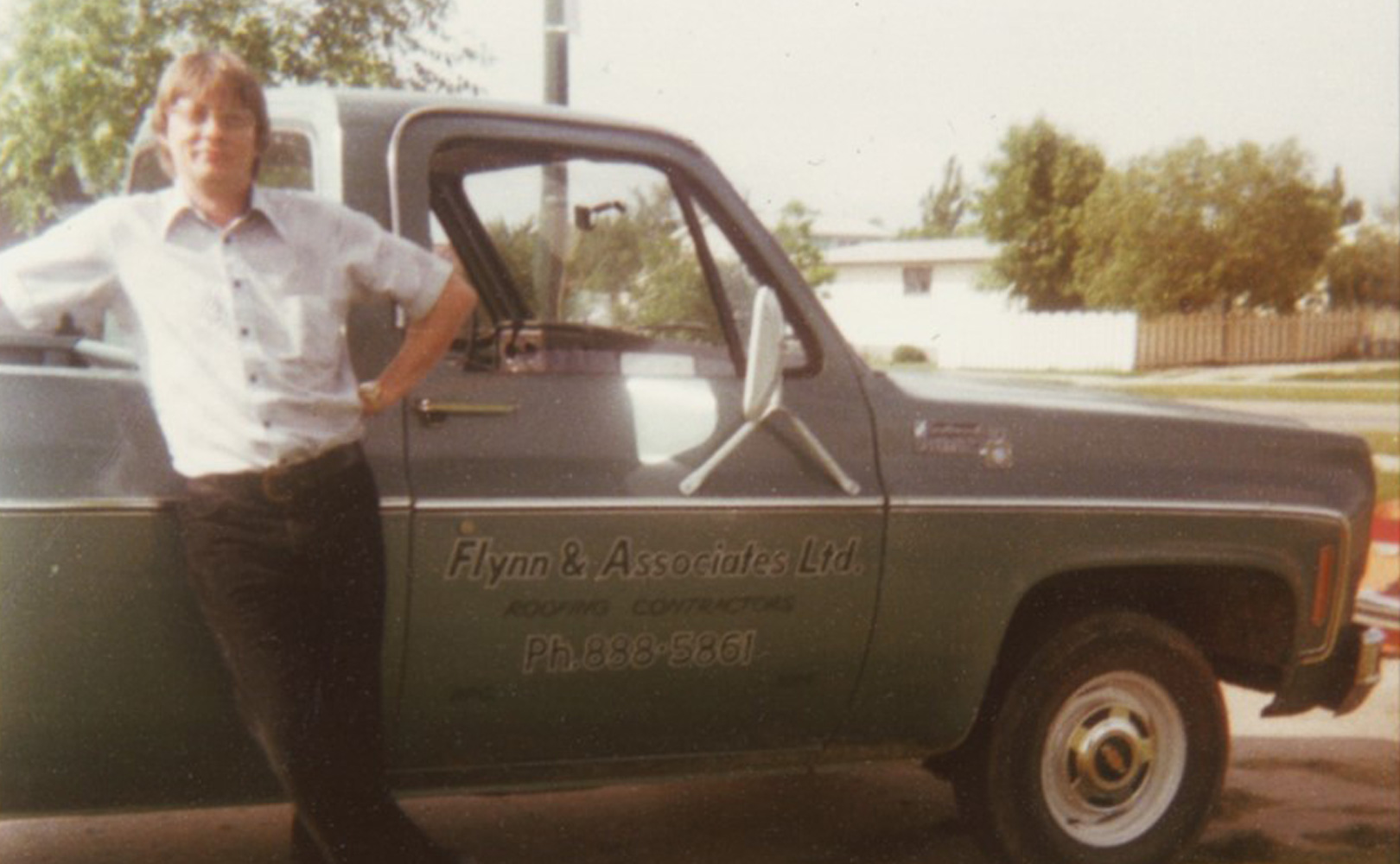 Donn Flynn in front of the first Flynn truck