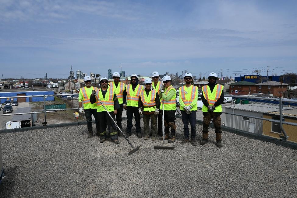 Flynn Canada Re-Roofing Crew on top of a roof